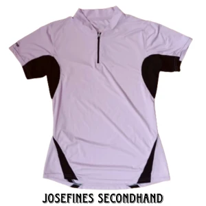 Lavendel träningströja - Lavendel träningströja med svarta detaljer och dragkedja. Är i fint skick