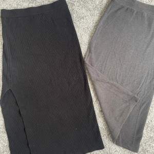 En svart stickad långkjol med en slitts på ena sidan, och en grå lång kjol. Båda är i bra skick och båda är xs 💞