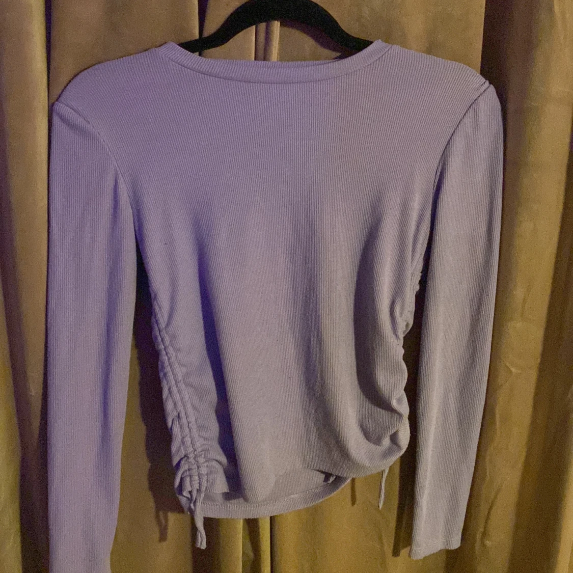 lila tröja