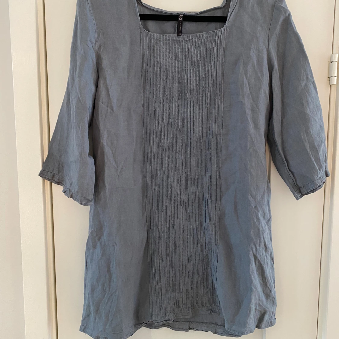 Ny grå tunika i linne från KUS Stockholm i strl 38