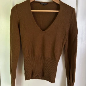 Stickad tröja - Använd