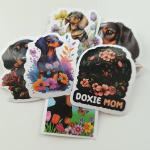 6st tax, hund klistermärken/stickers  - Klistermärken/stickers Motiv: tax/doxie hund  Antal: 6st  Skick: ny/oanvänd  Kul att använda till pyssel, scrapbooking och annat. Kan tex användas till att dekorera din bärbara dator, skateboard, resväska, etc. 