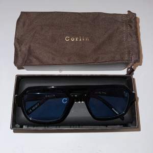 Säljer ett par solglasögon från Corlin Eyewear modell ”Sam”, kostar 1300kr och säljer för 600kr. Helt nya, aldrig använda!