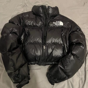 The North Face Womens nuptse 700 fill short jacket - In an excellent condition  Worn a few times No Issues Good as NEW Send a message for more pictures  Price negotiable