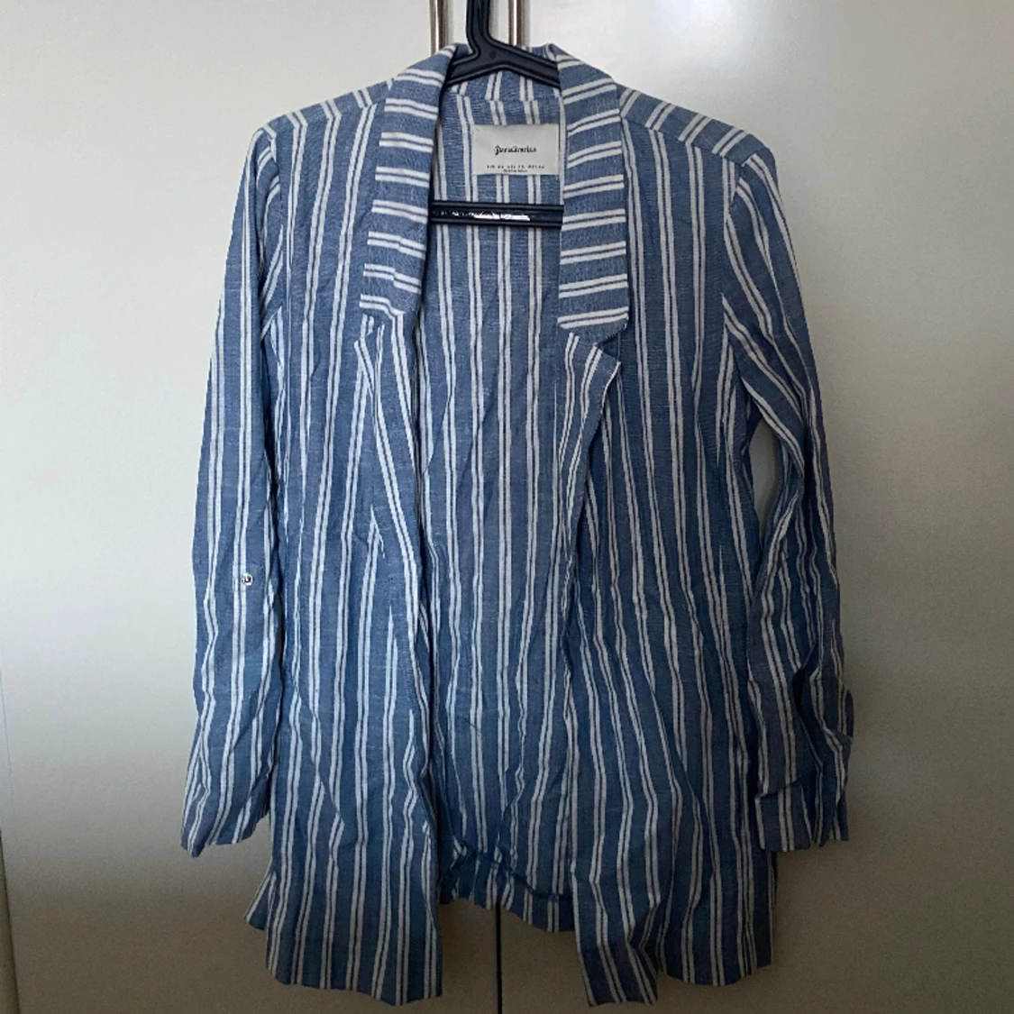 Randig kavaj med slits på båda sidor