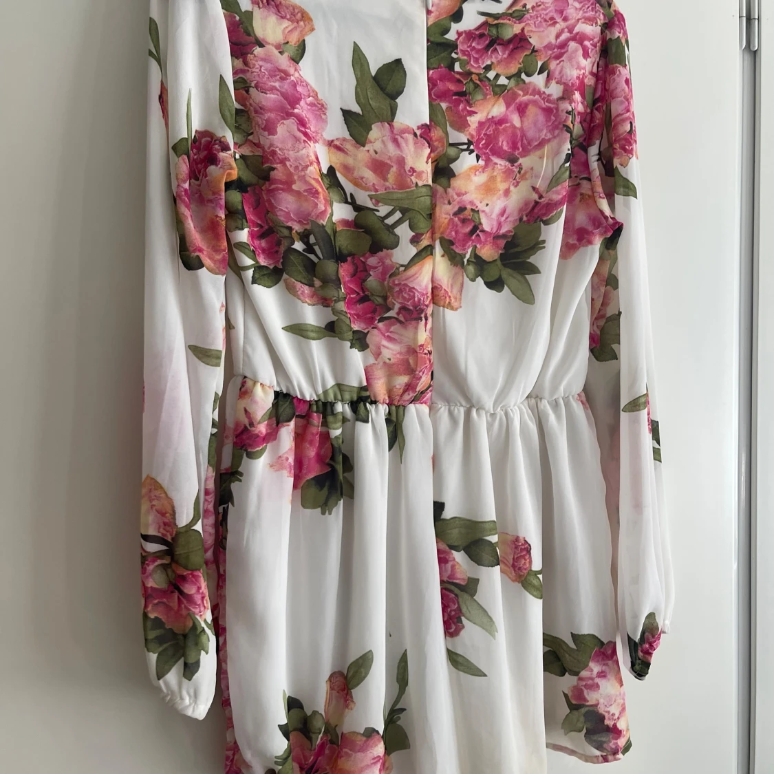 Blommig byxdress  - 90