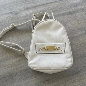 Juciy couture väska - Köpt på TJ Max för 900kr säljer för 220 då den knappt kommit till användning 