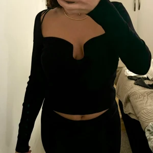 Tröja  - En helt ny tröja som aldrig kommer till användning 