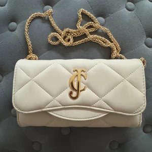 Juicy  couture väska nyskick - Aldrig använd, mynt och kort fodral