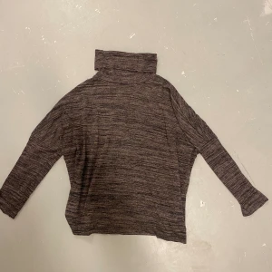 Polotröja - Strl L från Kappahl