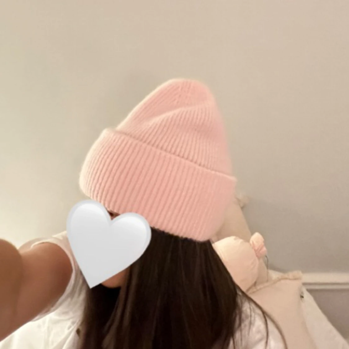 Babyrosa stickad mössa