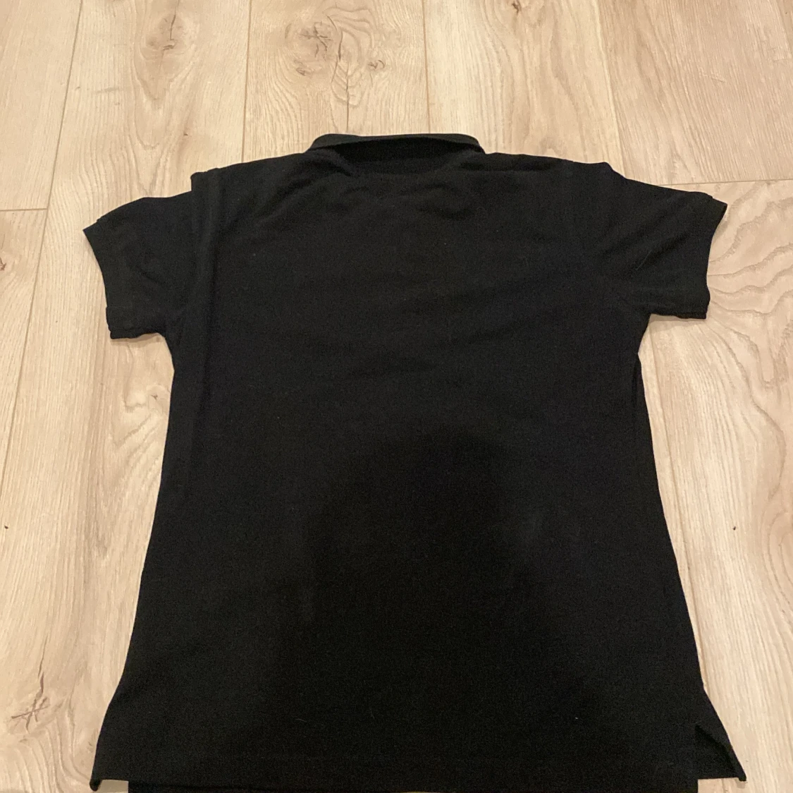 Svart pikétröja från Clique, M - 2