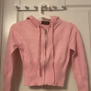 Catania kofta rosa - Rosa kofta från Catania storlek Xs