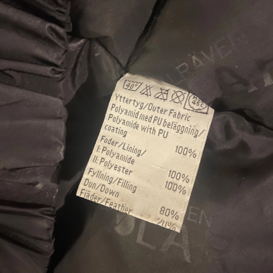 Mörkgrå dunjacka från Fjällräven - 3