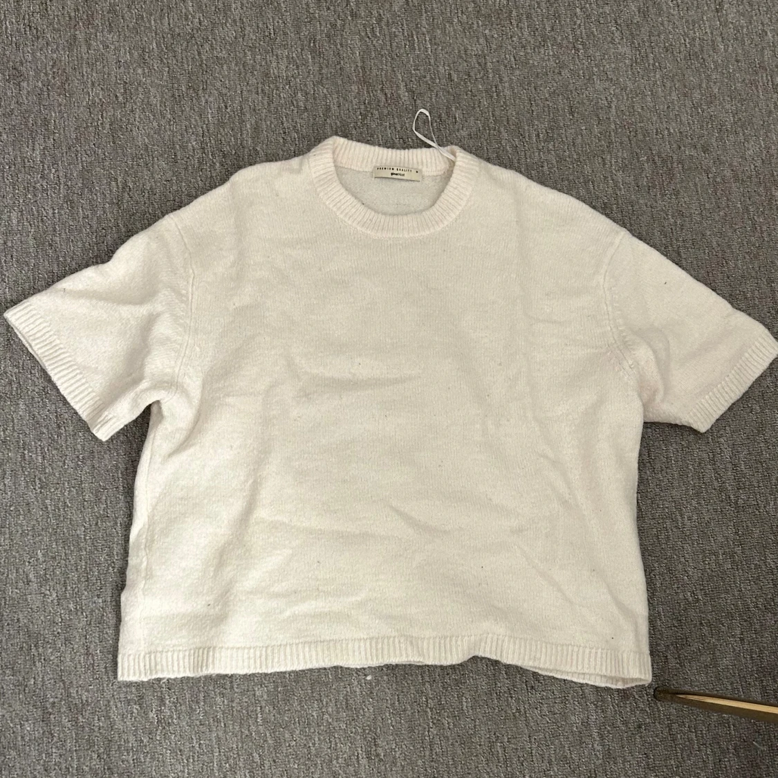 Vit stickad tröja från Gina Tricot