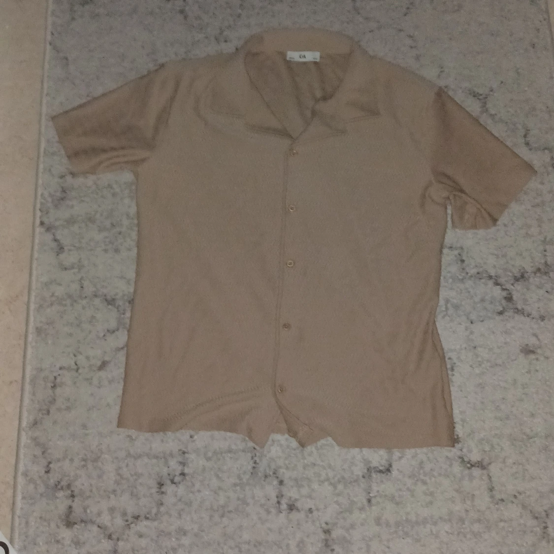 Beige kortärmad skjorta från C&A