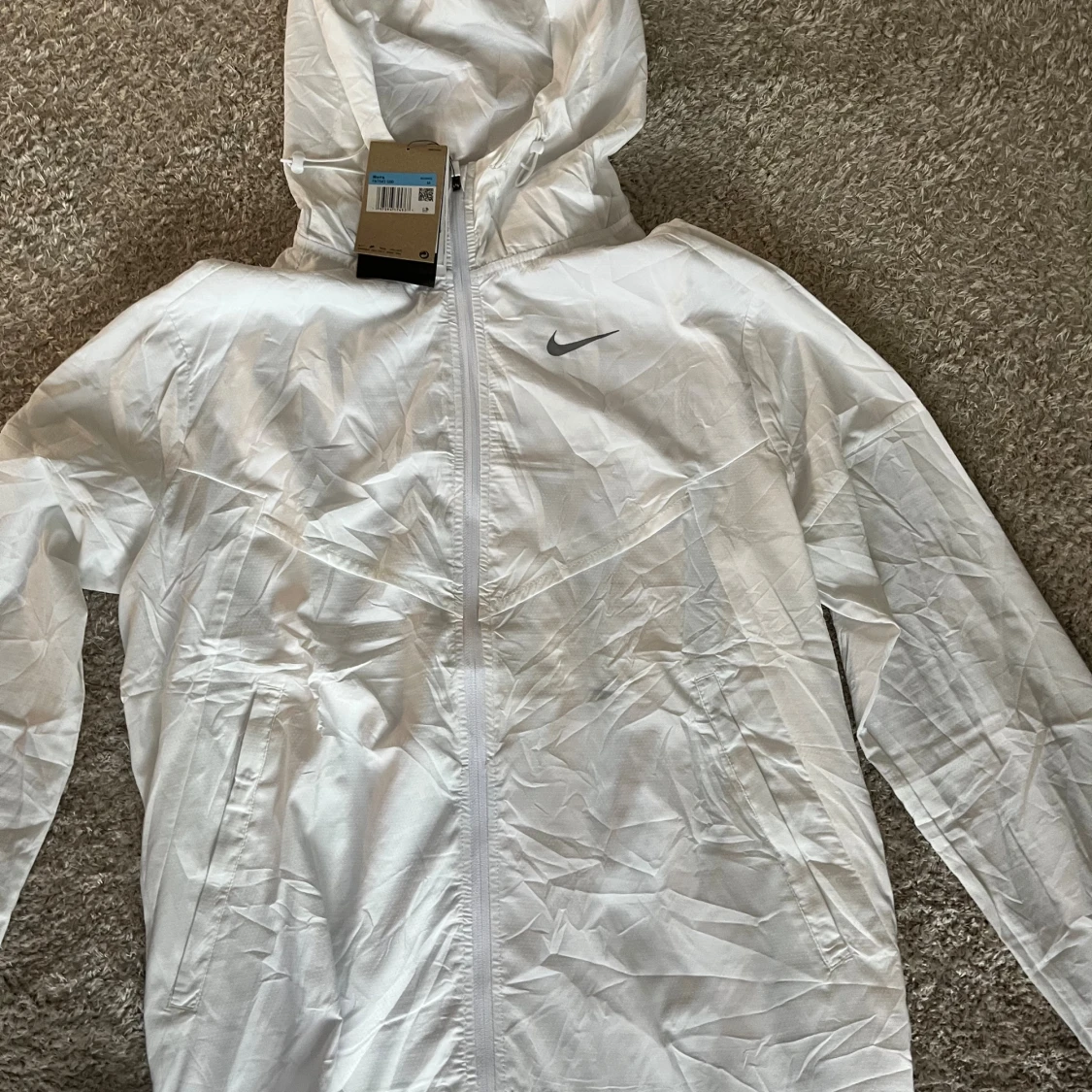 Vit Nike vindjacka med huva M