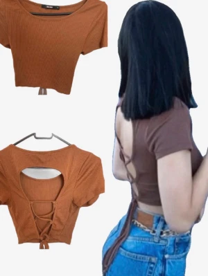 Brown Open Back Summer Top | Bik Bok | Size XS | Lightly Worn & Flattering Fit - 🌟 Lightly worn – only used a few times – Still in excellent condition, fresh and well-cared for. 👚 Soft, stretchy fabric – Comfortable and moves with you, perfect for all-day wear. ✨ Elegant open back design – Adds a touch of style while staying comfortable. 👗 Fits well at the bust – Supportive and flattering, sits nicely without slipping. ☀️ Perfect for summer – Pairs beautifully with jeans, skirts, or high-waisted shorts. 🛍️ Size XS from Bik Bok – True to size, fitted yet comfortable silhouette.