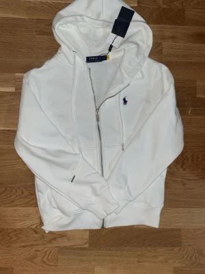 Ralph lauren kofta  - En Ralph lauren kofta perfekt för män vit färg 