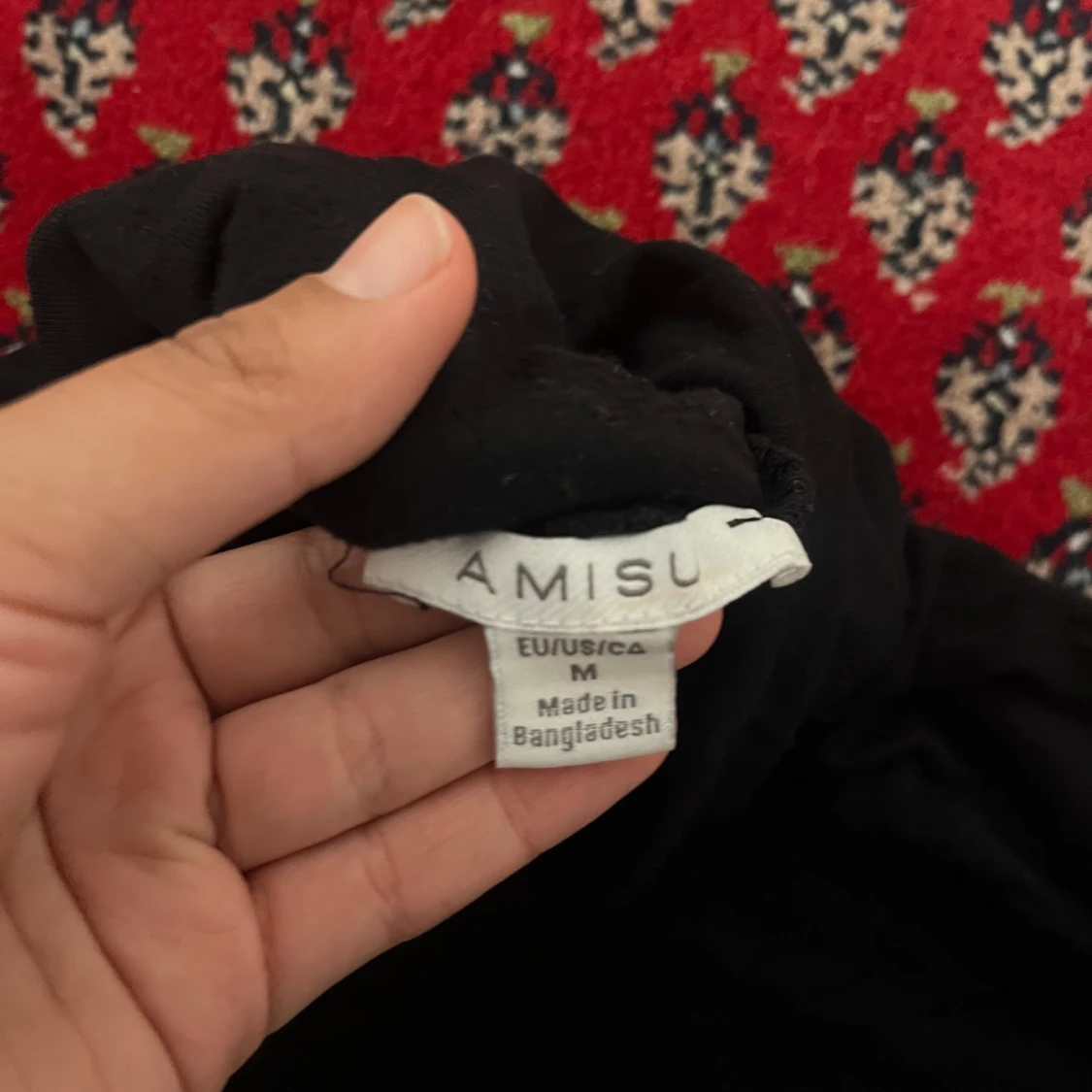 Svart polotröja från Amisu - 1