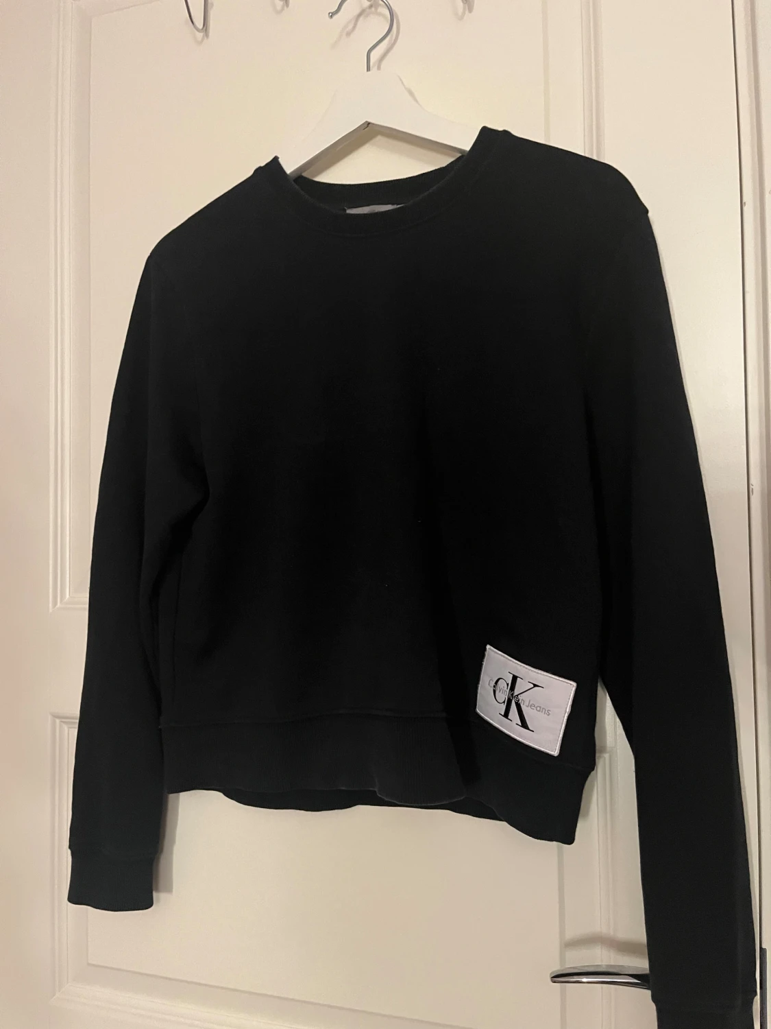 Svart sweatshirt från Calvin Klein Jeans