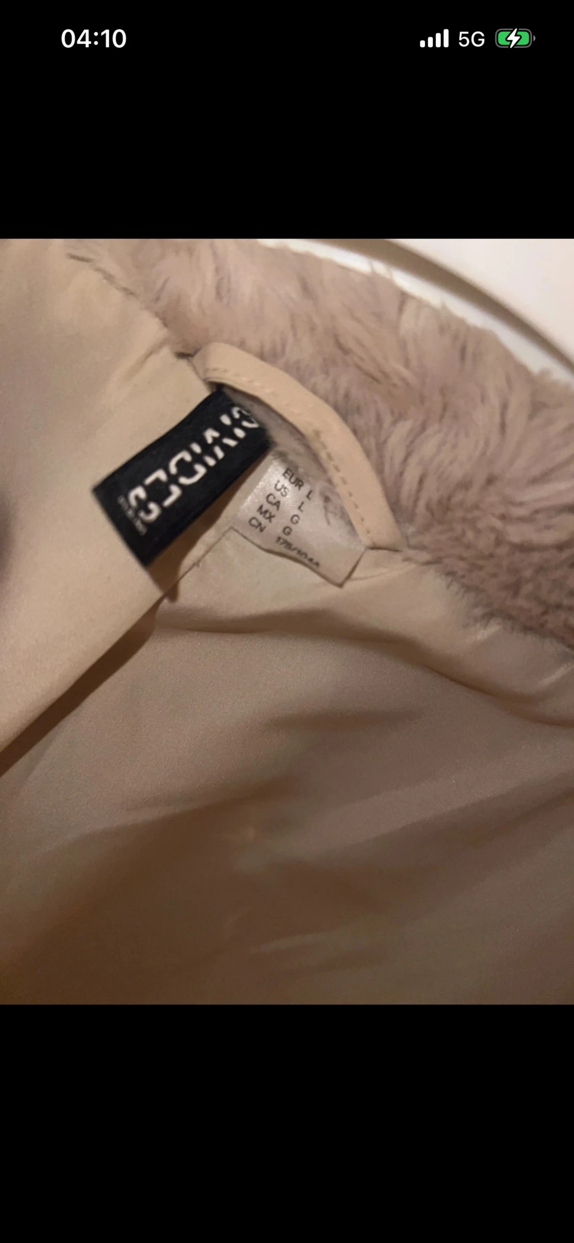 Beige pälsjacka från Divided L - 1