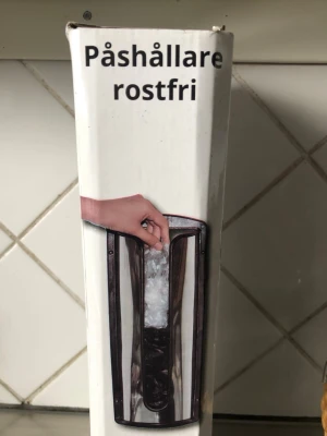 Påshållare i rostfritt i oupptagen förpu - Påshållare   i rostfritt  att stoppa påsar i för att smidigt ha till hands 