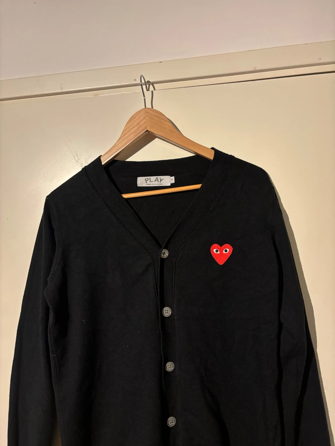 Svart kofta Comme des Garçons Play