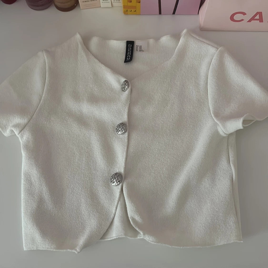 Vit kortärmad topp med knappar H&M