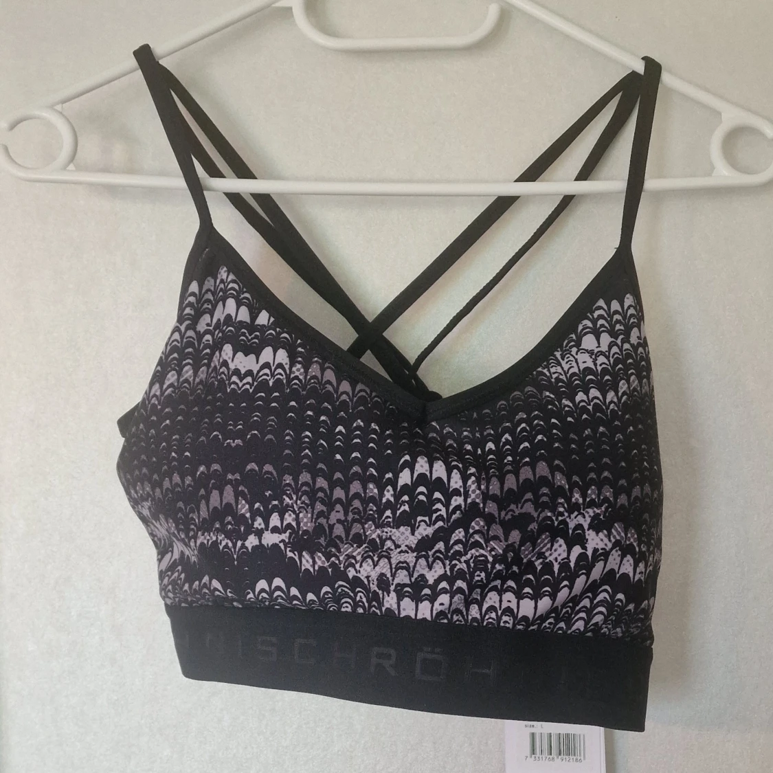 Svart mönstrad sport-bh från Röhnisch