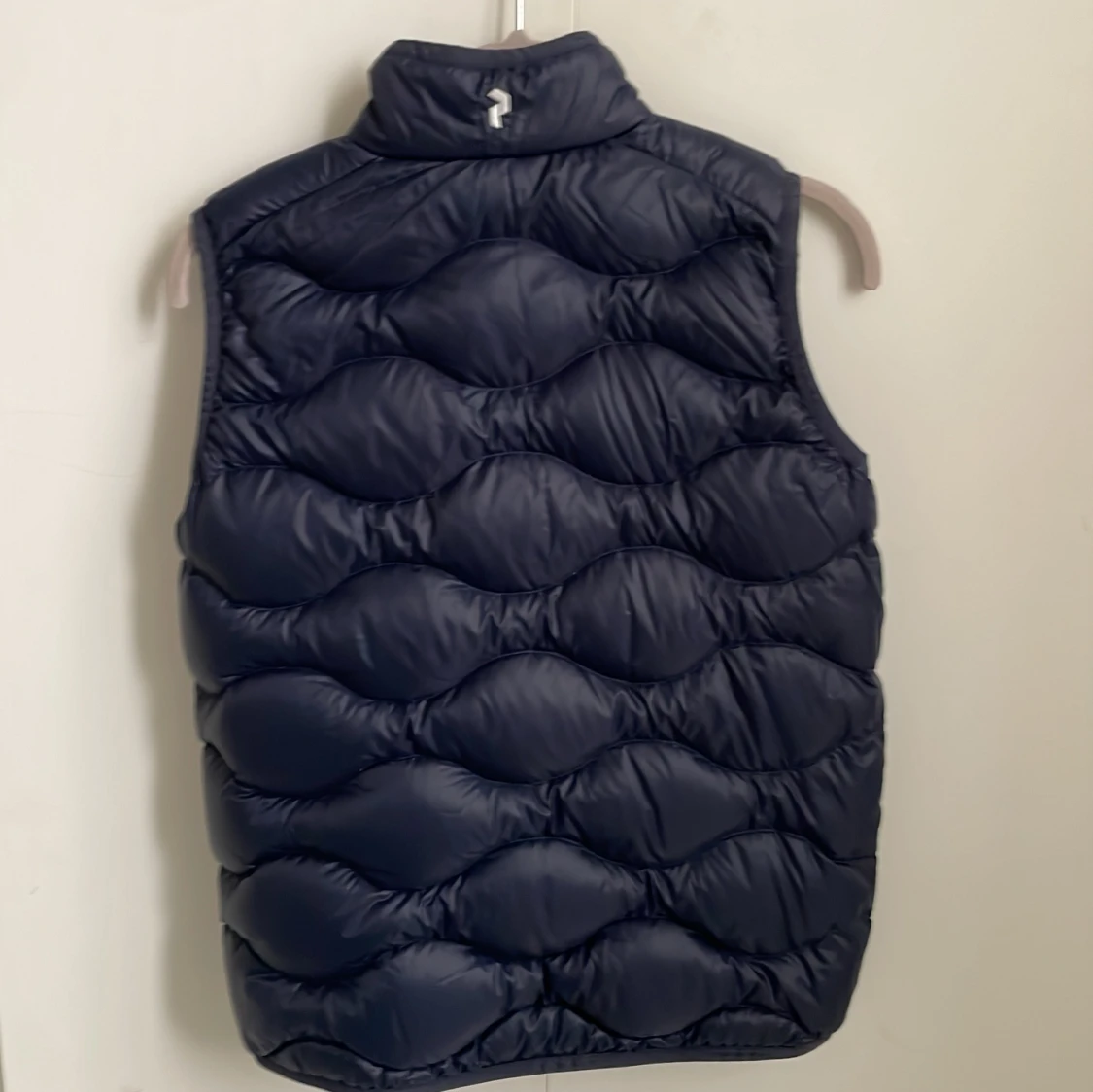 Mörkblå dunväst Peak Performance - 1