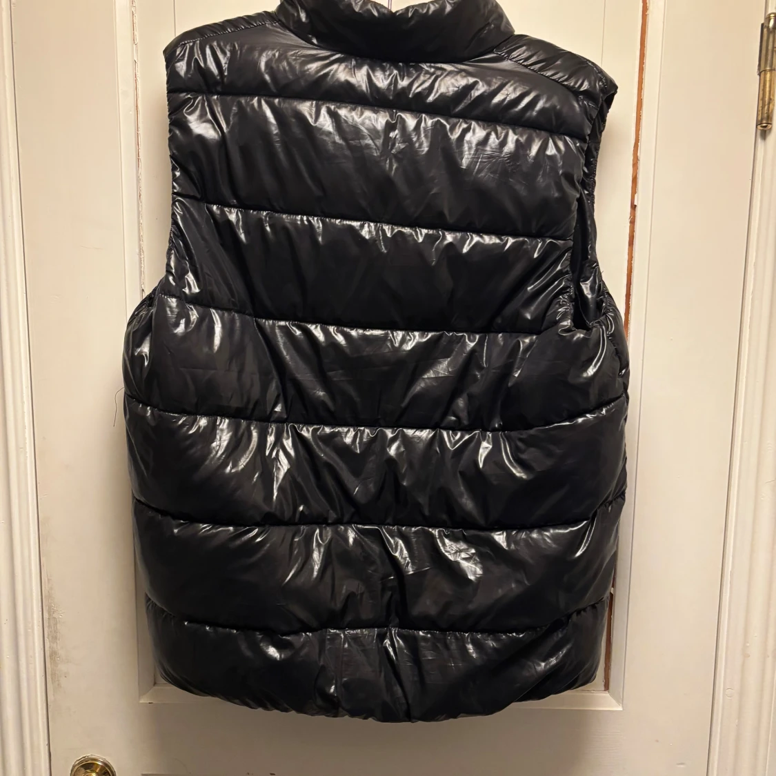 Svart dunväst med dragkedja - 1