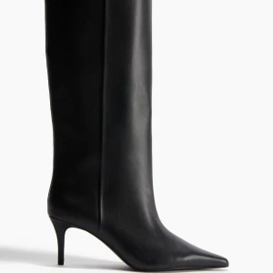Svarta höga stövlar med klack - Virala stövlarna från H&M. Aldrig använda. Storlek 38. 