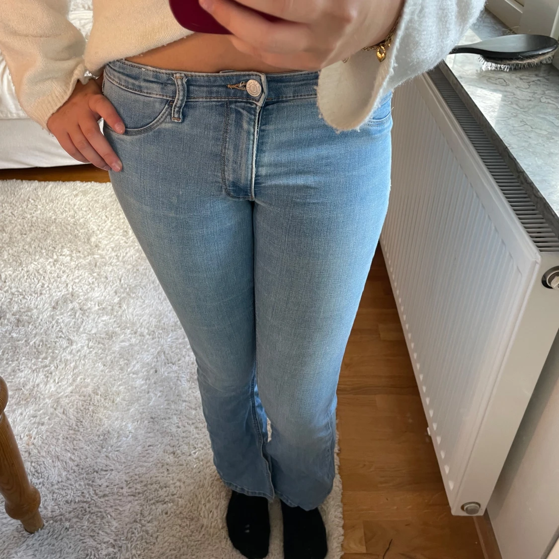 Ljusblå flare jeans low waist