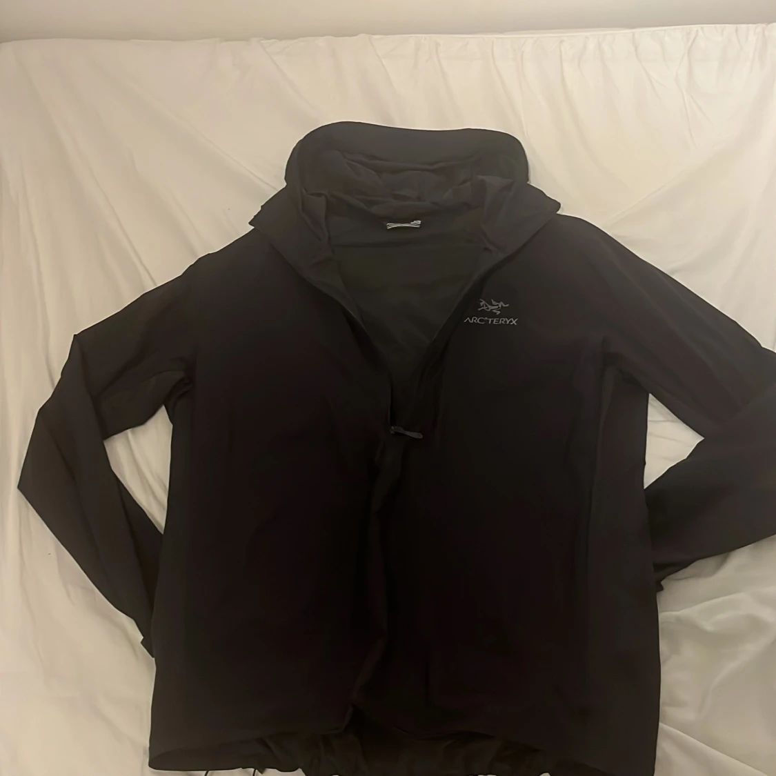 Svart vindjacka från Arc'teryx XL