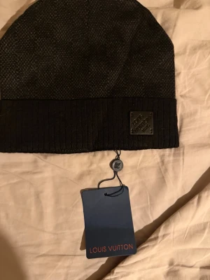 Svart Louis mössa - Ny skick