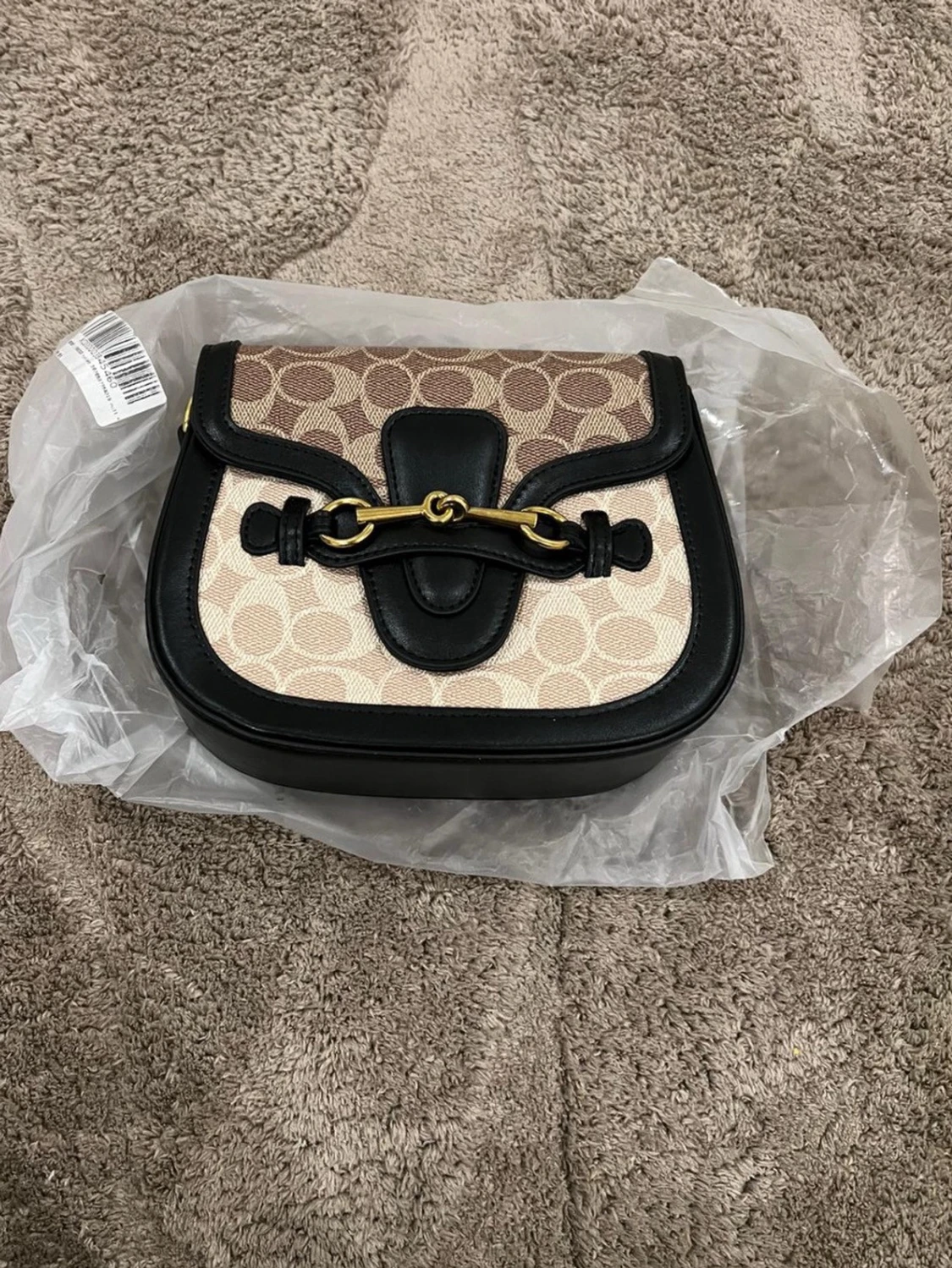 Coach axelväska med monogram och läder