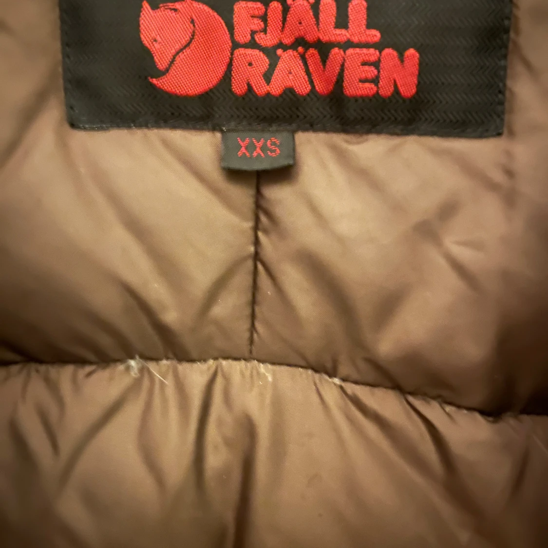 Brun dunjacka från Fjällräven XXS - 2