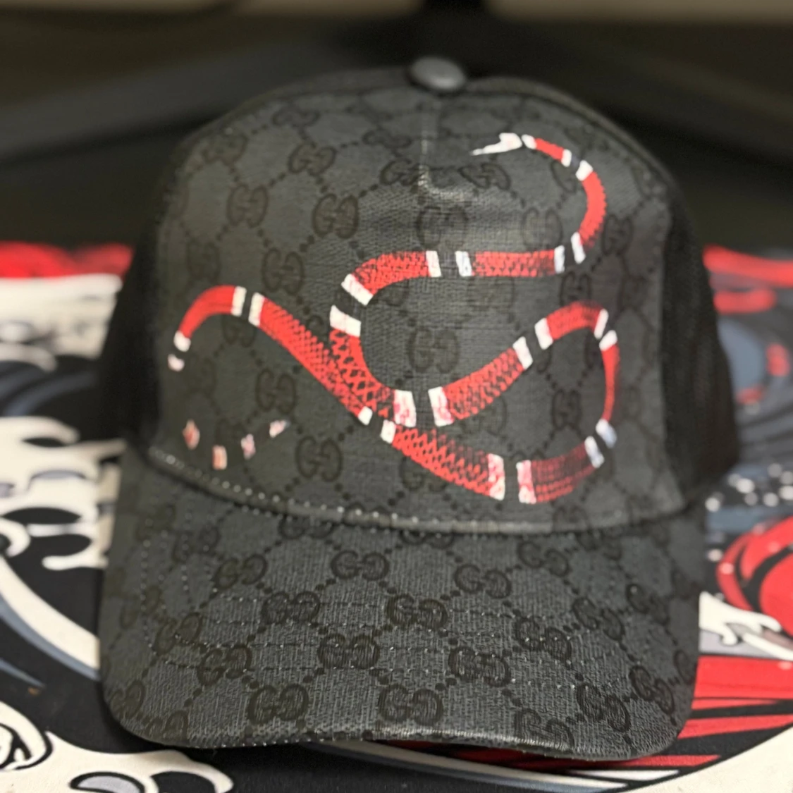 GG keps med orm tryck