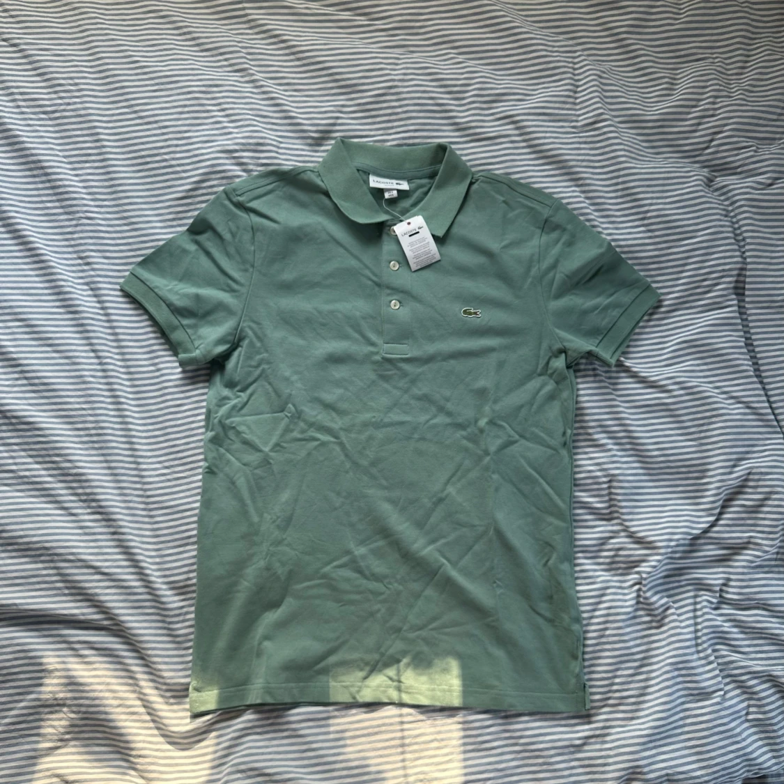 Grön pikétröja från Lacoste slim fit