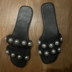 Tofflor  - Använda fåtal gånger . 