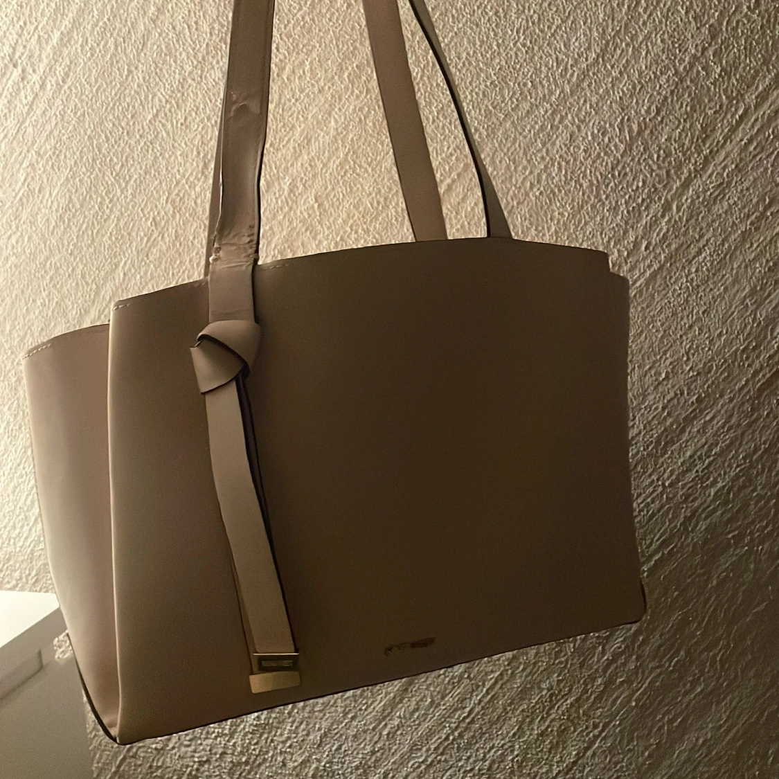 Beige axelväska från Nike west