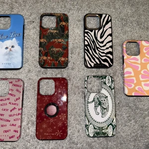 Burga iPhone 13 pro mobilskal - Snygga Burga skal för iPhone 13 pro olika designer: katt, djurmönster, text och färgglada motiv. Skalen är i fint skick utan synliga repor eller skador. 1st pris 150kr