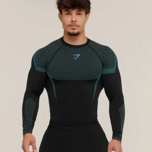 Gymshark tröja onyx v5 seamless long sleeve t-shirt - Säljer den populära Gymshark Onyx v5 muscle fit long sleeve i storlek L. Produkten är helt oanvänd och helt ny. Den är slutsåld överallt, alltså en exklusiv tränings tröja från gymshark. Detta är den senaste versionen med förbättrad passform, sömlös design och ventilerande paneler som framhäver kroppen perfekt. Perfekt för gymmet, löpning eller som en snygg tränings-topp till vardags. Priset går att diskutera. För fler bilder eller info vänligen skriv privat. (Digitalt kvitto finns) 