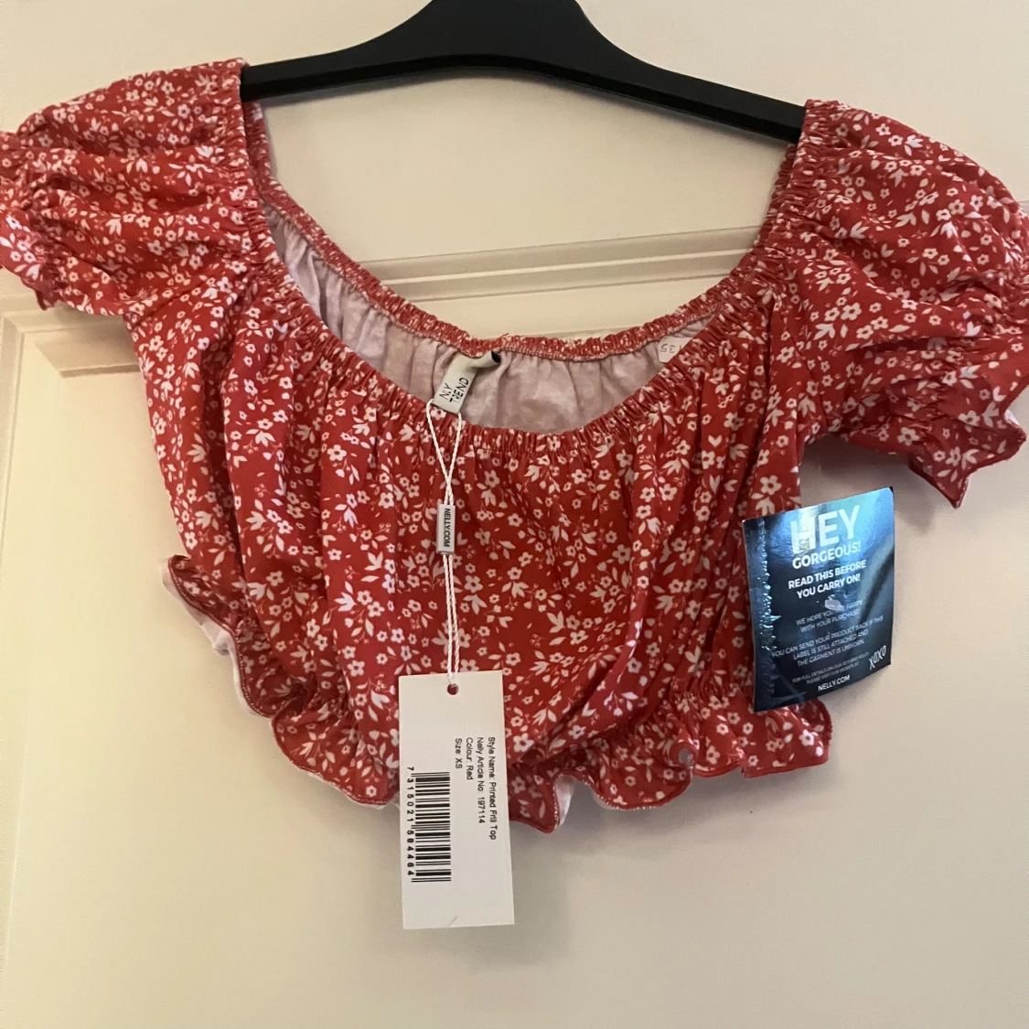 Röd blommig volangblus från Nelly