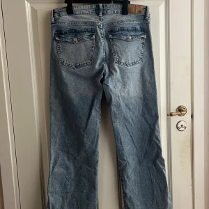 Ljusblå bootcut jeans XL short - 90’ boot från lager 157 i storlek xl/short