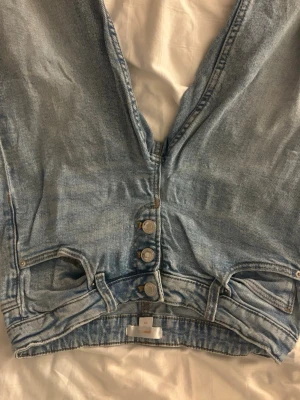 Blåa flare Gina jeans - Använda fåtal gånger