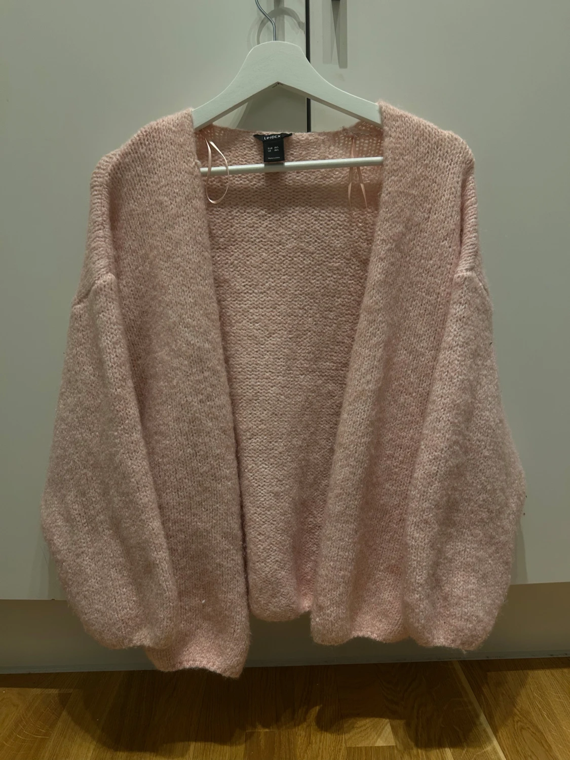 Ljusrosa stickad kofta från Lindex