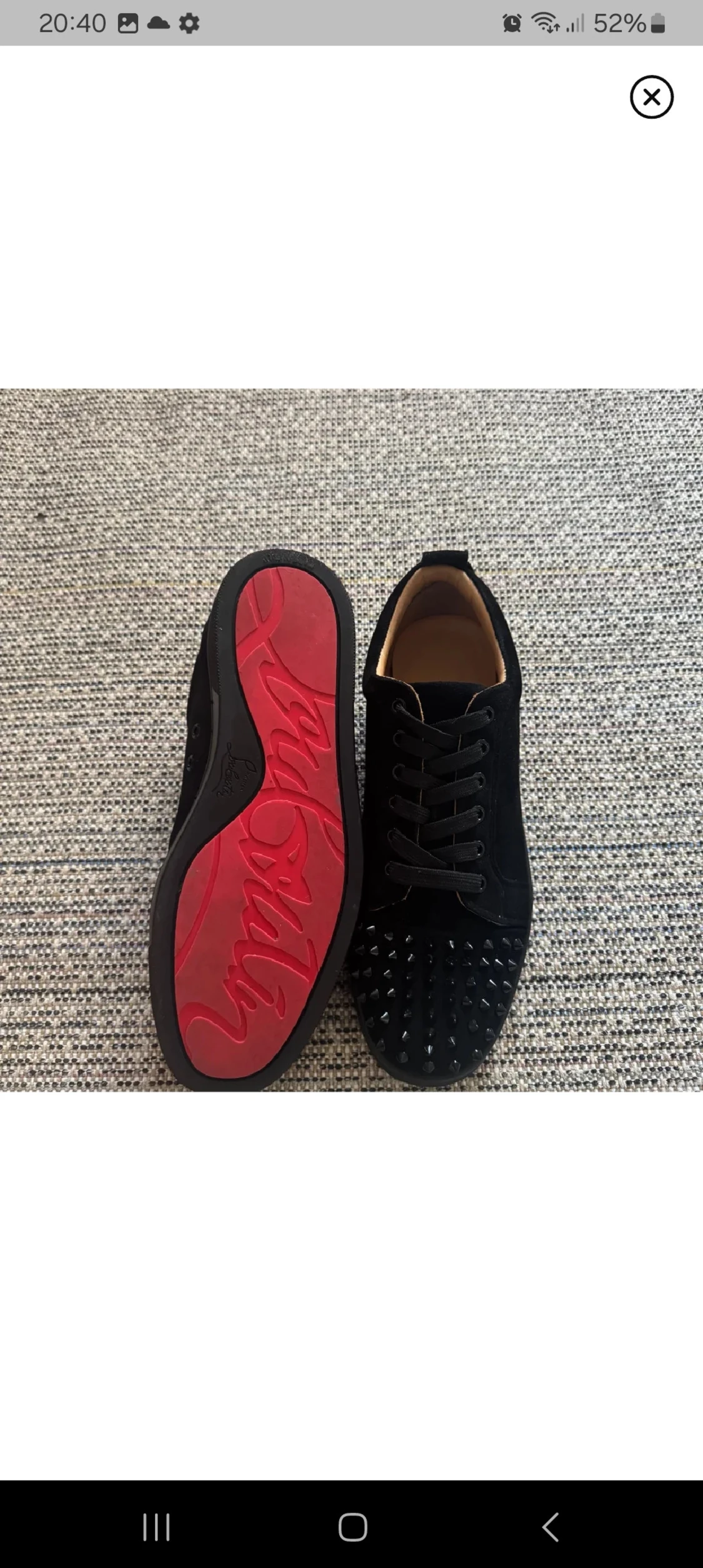 Svarta Louboutin sneakers med nitar