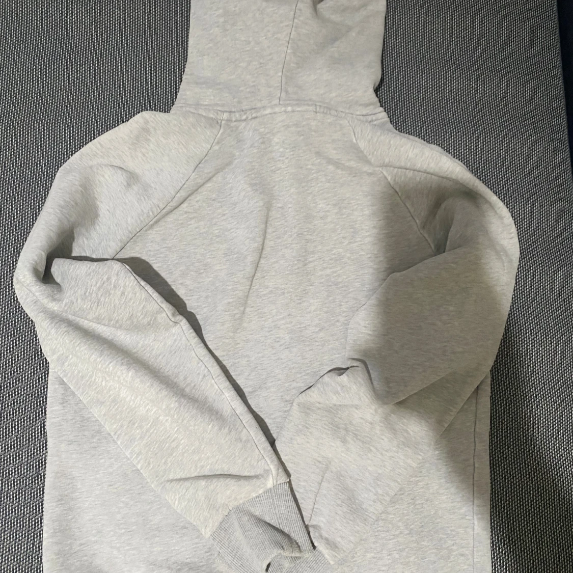 Ljusgrå hoodie Peak Performance - 1